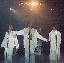 3T singing "I Need You" during their concert in Hannover, Germany (Brotherhood Tour 1996).