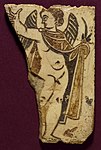Egyptian bone plaque of a putto, with wax inlay, 4th century