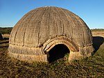 A reconstruction in a heritage site of KwaZulu-Natal of the Zulu people's variation of a hut called iQhugwane, which dominated as an indigenous abode during Dingane kaSenzangakhona's reign.