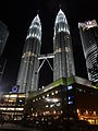 Night image of the Petronas Towers in Kuala Lumpur, taken from behind