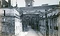 The gate in the early 20th century. Note its acquired black colouring