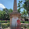 Red handprints marked on the Soldier's Monument on the plaza in Santa Fe, New Mexico in June 2020