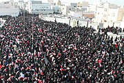 Women taking part in a pro-democracy sit-in in Sitra