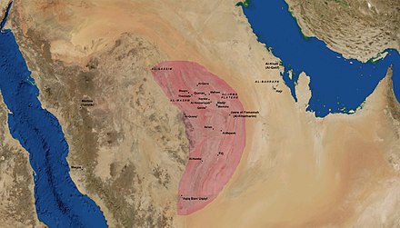 A satellite map of central Arabia and historic settlements, with a specified region shaded in red