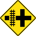 (W7-13) Railway Level Crossing on Crossroad (left)