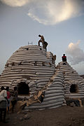 Eco-Dome[47] sandbag shelter under construction in Djibouti