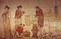 Mural painting from the Tomb of Zhang Kuangzheng (M10), Liao dynasty, 1058-1093 AD. Children and servants wear Khitan-style clothing and hairstyle; the standing women wears Han Chinese clothing. The hairstyle of the women is Khitan-style.[8]