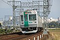 A 10 series (6th batch) EMU on an express service bound for Kokusaikaikan