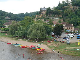 Canoes on the bank of the Dordogne river in Limeuil