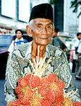 A Javanese man wearing typical contemporary batik shirt