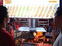 Many flavors of Taiwanese sausages are sold by night market vendors.