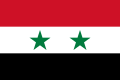 The flag of Syria, a charged horizontal triband.