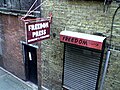 Freedom Press sign before the 2013 fire
