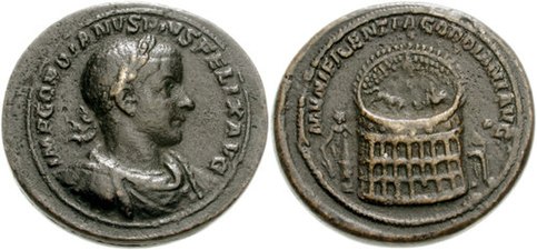 Medallion showing on obverse Gordianus III, legend IMP GORDIANVS PIVS FELIX AVG. Reverse: bull contending with elephant within the Colosseum, seen from above; Colossus of Nero and Meta Sudans, and the Temple of Venus and Rome, or the Ludus Magnus on either side; legend MVNIFICENTIA GORDIANI AVG