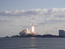 The H-IIA F11 launch vehicle lifting off from Tanegashima Space Center