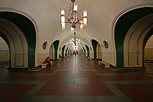 Wide, round-ceilinged hallway of VDNKh Metro station
