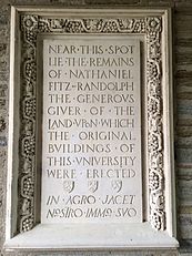 A plaque in the eastern archway of Holder Hall commemorating the burial place of Nathaniel FitzRandolph