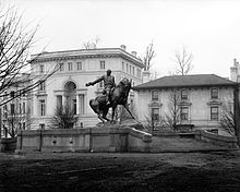 Photograph of a sculpture depicting a man riding a horse