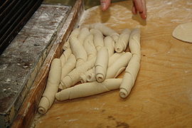 Rolled rohlík before baking