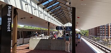 King Street–Old Town (opened 1983) shows a modified elevated station design, used in historic Alexandria, as it was less intrusive.