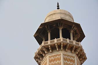 White marble cupolas cap minarets at the Tomb of Jahangir in Lahore, Pakistan