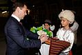 Turkmen boy wearing a papakha (telpek) with Russian President Dmitry Medvedev at Turkmenbashi International Airport