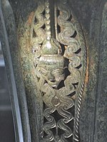 Base of the handle at Dürnberg; the head has a characteristic Celtic "leaf-crown".[14]