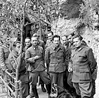 Josip Broz Tito (far right) with his ministers and staff