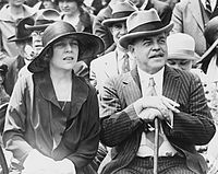 Alice Roosevelt Longworth and her husband, House Speaker and Ohio Representative Nicholas Longworth on the steps of the US Capitol in 1926