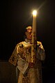 A Paschal candle being carried