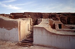 Ruins of walls and a street in the desert