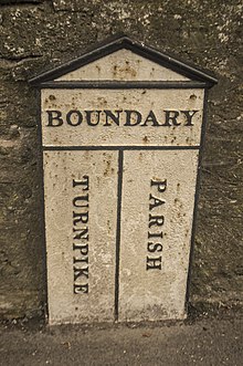 Sign marking boundary between parish and turnpike trust responsibility, Frome, Somerset