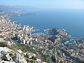 Image 14In the centre is La Condamine. At the right with the smaller harbour is Fontvieille, with The Rock (the old town, fortress, and Palace) jutting out between the two harbours. At the left are the high-rise buildings of La Rousse/Saint Roman. (from Monaco)