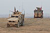 U.S. and Turkish forces conduct joint patrols on the outskirts of Manbij, Syria, 8 November 2018