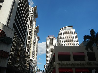 The Aurora Tower and the New Frontier Theater in the foreground, with the Manhattan Parkway and the Manhattan Parkview along Gen. Malvar Avenue
