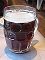 Dimpled glass beer pint jug