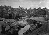Encampment by a river in the Karo heights, Sumatra (1870)