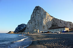 View of the Rock of Gibraltar from the northern end of Eastern Beach, on the eastern Mediterranean coast of Gibraltar.