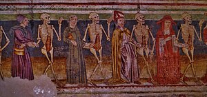 A mural depicting a cardinal, a bishop, a monk and a peasant dancing with skeletons