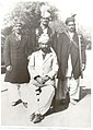 Standing, left to right: Doctor Masdar Ali (Physician of the Nawab of Amb), some servants of the Nawab of Amb) Sitting: Nawabzada Mohammad Ismail Khan Tanoli of Chanser and brother of Nawab Khan i Zaman Khan Tanoli