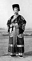 Third-rank Official at Yuan Shikai's visit to the sacrificial ceremony at the Temple of Heaven; he is wearing a robe with five roundels.