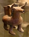 Bull-shaped oenochoe with earrings (Tarquinia National Museum)