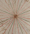 Early 32-wind compass rose, shown as a mere collection of color-coded rhumblines, from a Genoese nautical chart (c. 1325)