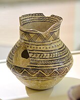 Pottery jar from Mesopotamia, modern-day Iraq. Halaf period, 4900-4300 BC. Erbil Civilization Museum, Iraqi Kurdistan.
