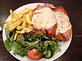Swiss schnitzel, served with french fries and side salad