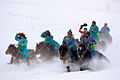 Tuvan horse-riders wearing deel