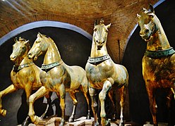 four gilded horses
