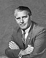 Wernher von Braun, who co-developed the V-2 rocket, the first artificial object to travel into space. Described by others as the "father of space travel",[89] the "father of rocket science",[90] or the "father of the American lunar program".[91]