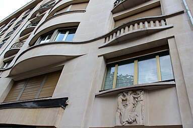 Art Nouveau influences – Sinuous curves on the façade of Avenue Montaigne no. 26, Paris, by Louis Duhayon and Marcel Julien (1937)[56]