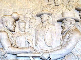 Dingane signing a treaty with Piet Retief, as depicted in the Voortrekker Monument